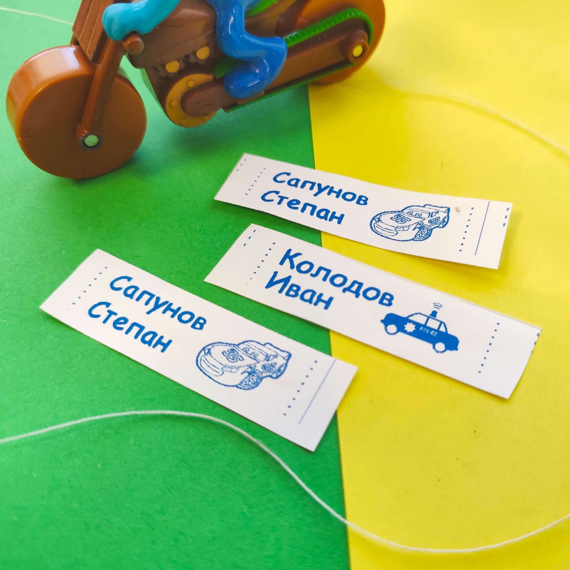 Маркировка детской одежды синим риббоном на нейлоне - текст с рисунком